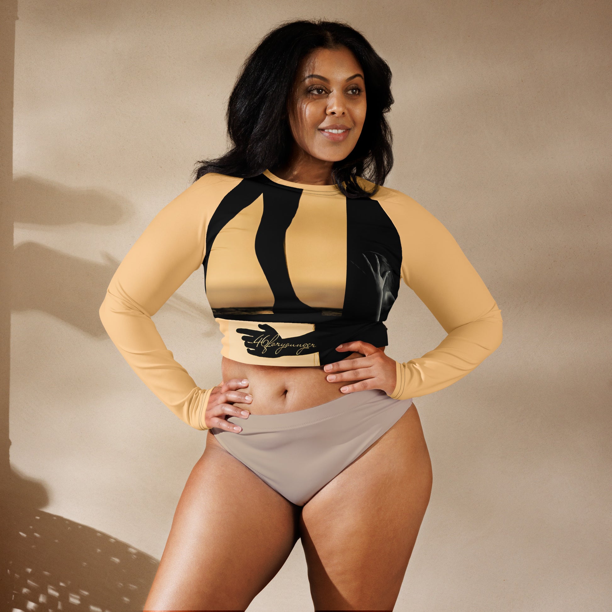 A-Ray of Emotions Long Sleeve Crop Top - AH Peach: A canvas for creative magic, inspired by the profound quote, in the enchanting Peach color.   'Every work of art begins with a ray of emotion, a torch of inspiration, a question searching for an answer.' Explore the journey of creativity in this captivating hue." - Plus Size