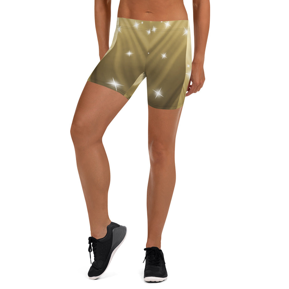 Female artist shine bright in the spotlight while rocking your Gold Spotlyght Short Shorts.  Elevate your style and confidence with our statement fashion for artists.
