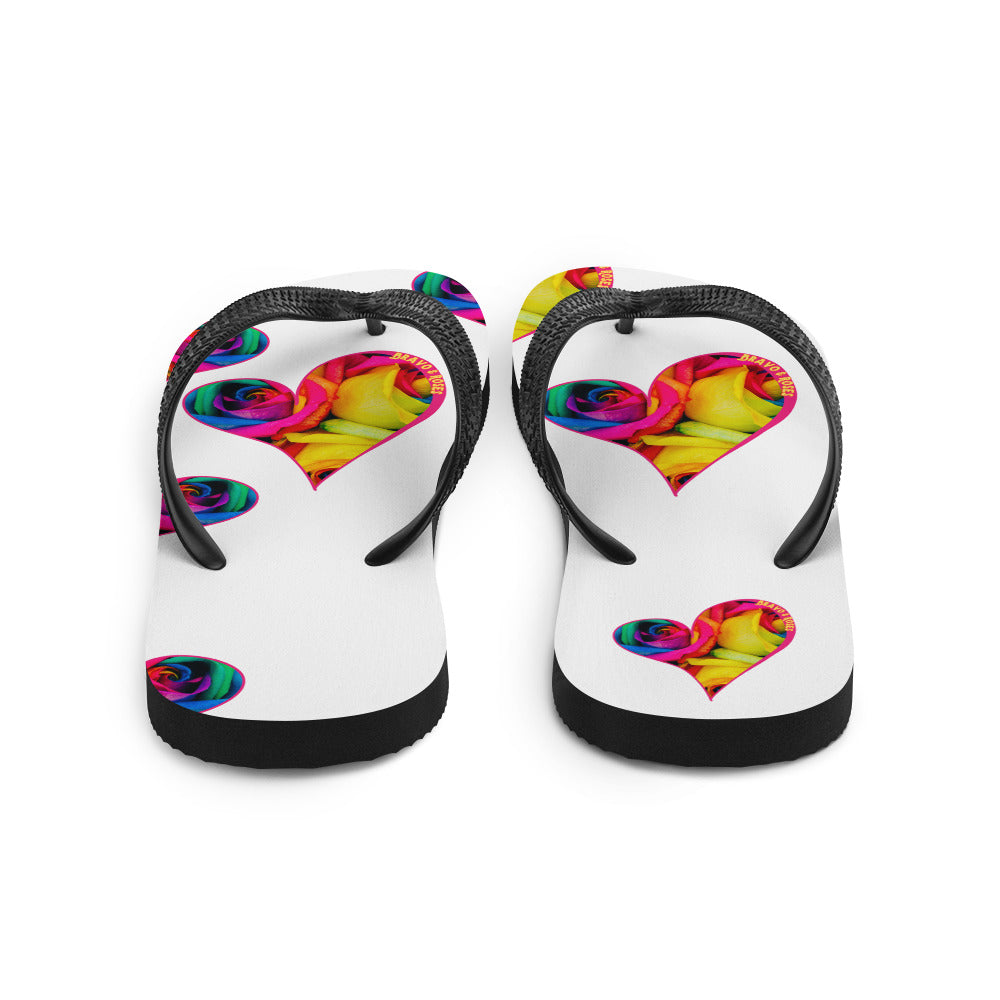 🌟 Elevate your style with Bravo & Roses Signature flip flops! 🌹✨  🎨 Calling all Spotlyght Seekers and Art Enthusiasts! 🎨 These flip flops are more than just footwear – they're a celebration of art and creativity! 🎉 Embrace your artistic spirit with every step you take.