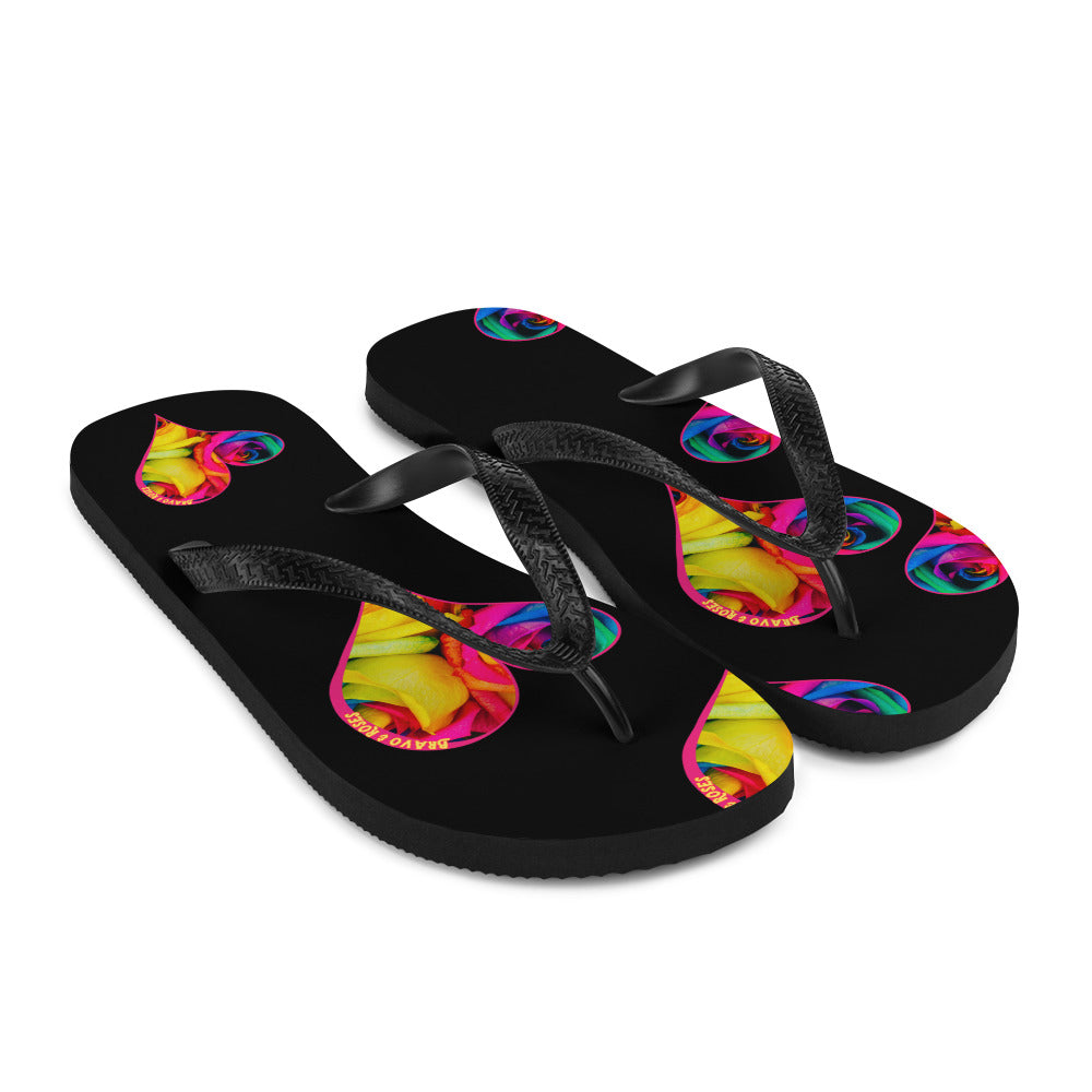 🌟 Elevate your style with Bravo & Roses Signature flip flops! 🌹✨  🎨 Calling all Spotlyght Seekers and Art Enthusiasts! 🎨 These flip flops are more than just footwear – they're a celebration of art and creativity! 🎉 Embrace your artistic spirit with every step you take.