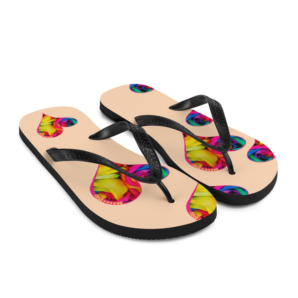 🌟 Elevate your style with Bravo & Roses Signature flip flops! 🌹✨  🎨 Calling all Spotlyght Seekers and Art Enthusiasts! 🎨 These flip flops are more than just footwear – they're a celebration of art and creativity! 🎉 Embrace your artistic spirit with every step you take.