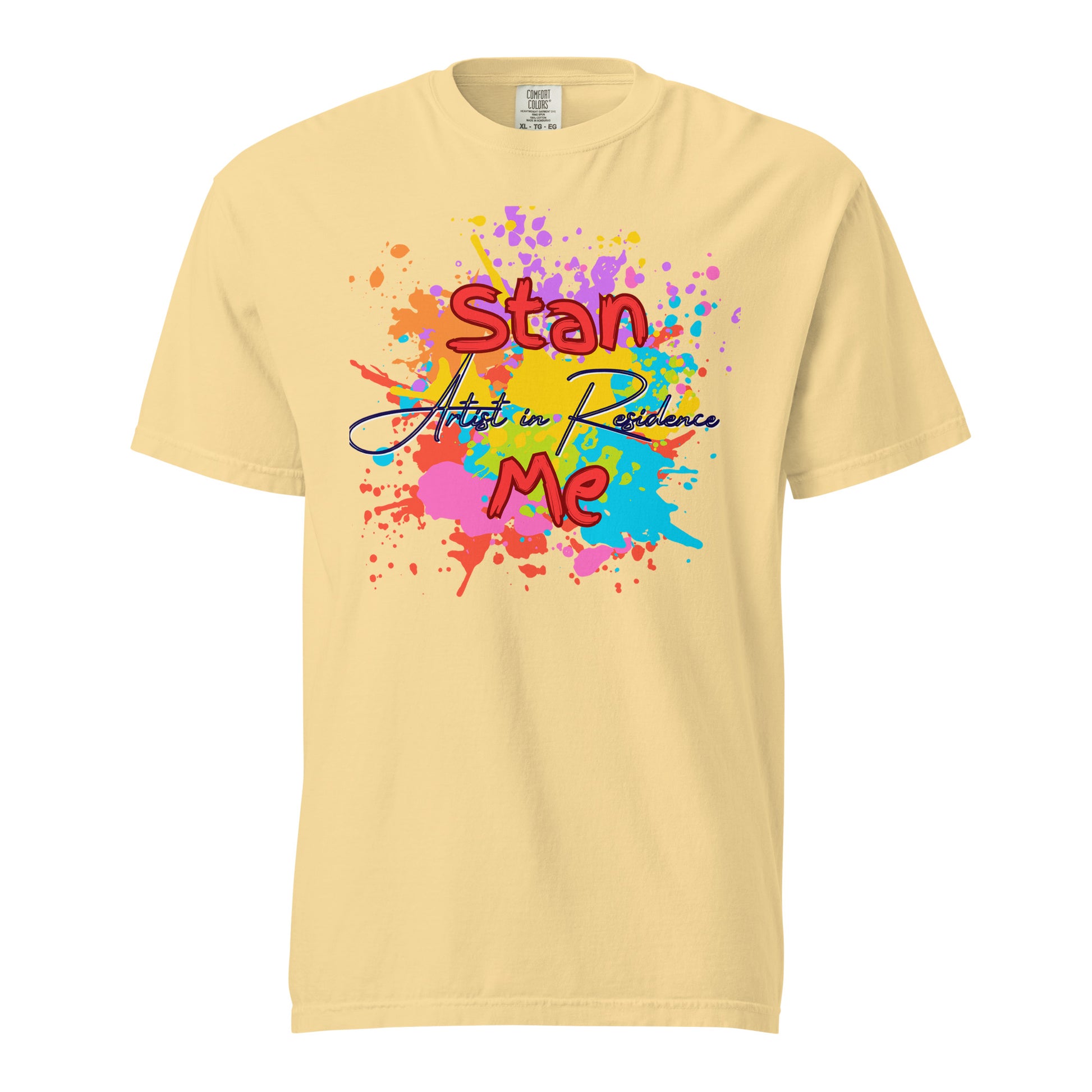 “Stan Me, Artist in Residence” tees featuring paint splatter designs, blending artistic creativity with stan culture. Available in 8 unique styles. Perfect for artists looking to attract fans and gigs. yellow tee