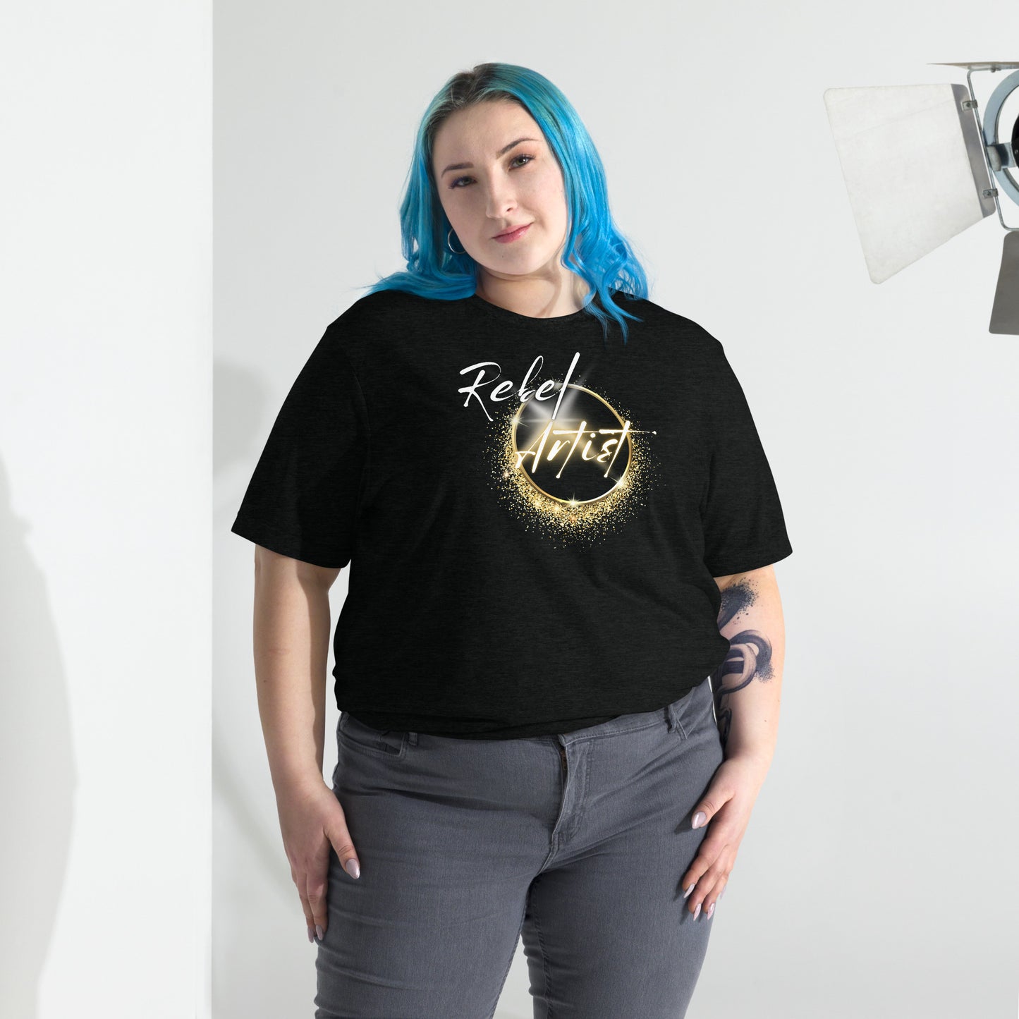 Rebel Artist Short Sleeve T-Shirt: A dynamic, lightning bolt-inspired design in Solid Black, Charcoal Black, and Emerald colors. Crafted from airy triblend fabric for ultimate comfort and freedom. Unleash your creativity and courage with this expressive and liberating t-shirt. ⚡🖤🌑 #FashionFreedom #RebelArtistApparel #plussize